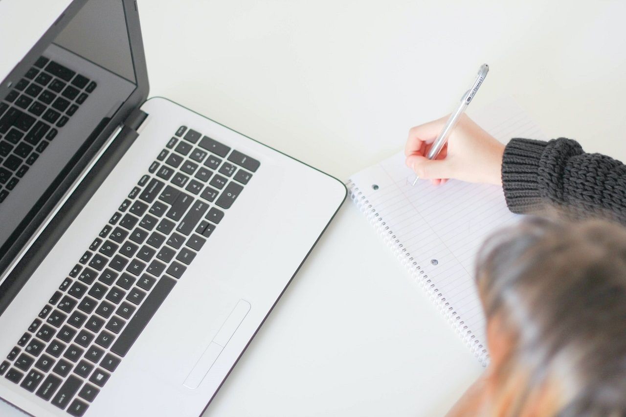 Image of a laptop user attending an interview