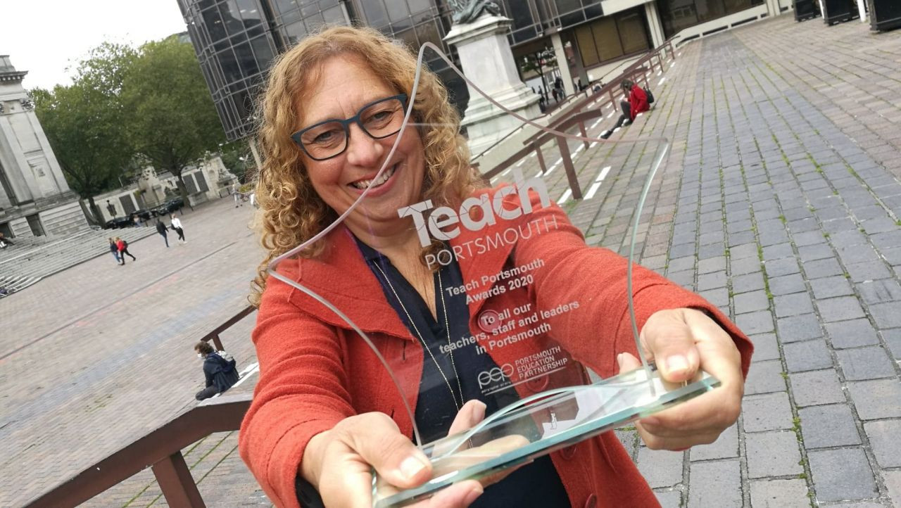 Councillor Suzy Horton holding the Teach Portsmouth Awards trophy design for the city's star teachers